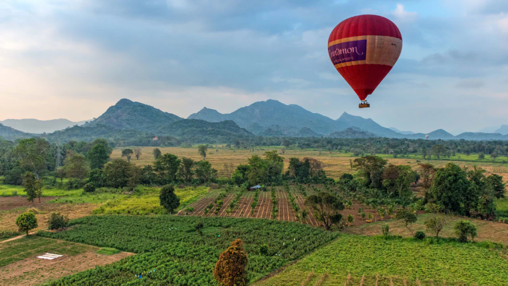 Hot Air Balloon Ride: 7 Magical Secrets to See Dambulla from Above 1 An Ultimate Sri Lanka Hot Air Balloon Ride over Sigiriya Rock Fortress, offering a breathtaking aerial view of the Cultural Triangle near Dambulla.