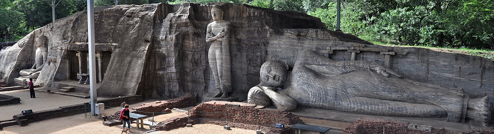 Ancient Kings & Wild Elephants: 7 Ultimate Reasons to Book Polonnaruwa Safari 3 Ancient rock carvings at Gal Vihara in Polonnaruwa, part of a Book Polonnaruwa Safari Combo Tour.
